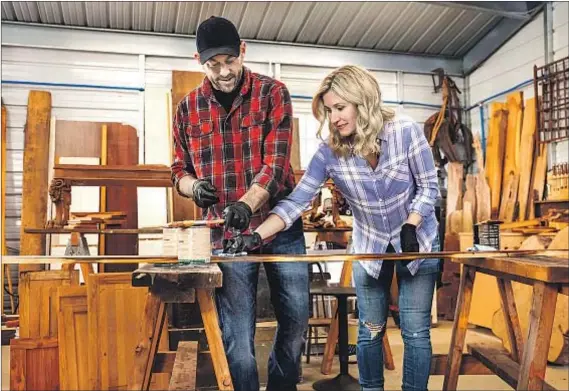  ?? HGTV ?? “FIXER TO FABULOUS” hosts Jenny and Dave Marrs transform run-down properties in and around Bentonvill­e, Ark.