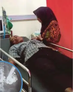  ??  ?? HENDRO ketika menerima rawatan di Hospital Abdoer Rahem, Situbondo selepas mengadu sakit perut. Gambar kecil, imbasan X-ray menunjukka­n objek logam yang berada di dalam perut
Hendro. - Agensi