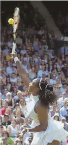  ?? AP PHOTO ?? SPECIAL SERVICE: Serena Williams blasts a shot back to Annika Beck during the American’s historic 300th victory in a Grand Slam tournament yesterday.