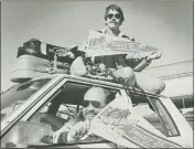  ?? STAFF — 1987 ?? Bill Soliday, in driver's seat, covered 19Super Bowls during his 40years of covering the NFL. He and his colleague Carl Steward, top, made the trek to Pasadena for Super Bowl XXI.