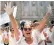  ??  ?? A woman shows her hands painted in white during a demonstrat­ion called by the Hablemos/ Parlem grouping