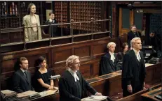  ??  ?? Katharine Gun ( Keira Knightley) stands in the dock as her bewigged barrister Ben Emmerson (Ralph Fiennes) and prosecutor Mark Ellison (Angus Wright) go through the motions in