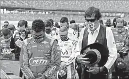  ?? JOHN BAZEMORE/AP ?? Bubba Wallace, left, with team owner Richard Petty, is the only Black driver in the Cup Series.