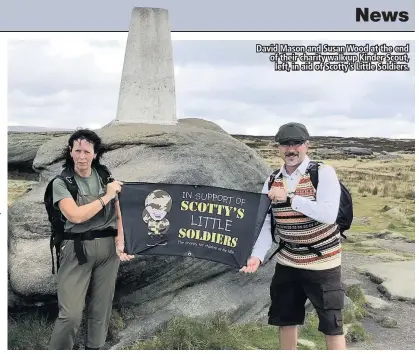  ??  ?? David Mason and Susan Wood at the end of their charity walk up Kinder Scout, left, in aid of Scotty’s Little Soldiers.