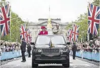  ??  ?? Queen Elizabeth II and the Duke of Edinburgh celebrate her 90th birthday