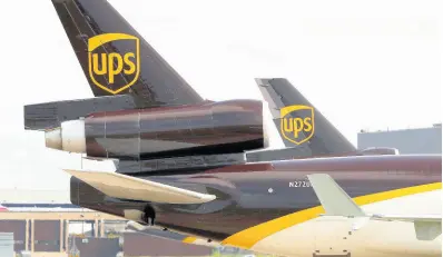  ?? AP ?? In this June 24, 2019 photo, a UPS aircraft taxis to its hangar area on arrival at Dallas-Fort Worth Internatio­nal Airport in Grapevine, Texas.