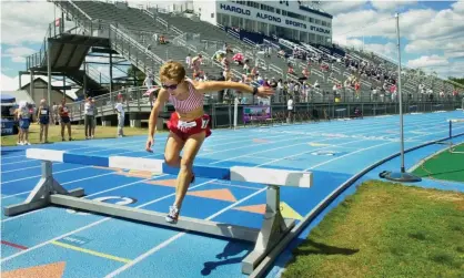  ?? Photograph: Portland Press Herald/Getty Images ?? Pam Alley-Morrill clears a hurdle while competing in the women’s 2,000-metre steeplecha­se.