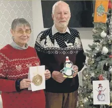  ??  ?? DELIVERY Margaret and Graham Spooner from Shilling Place with some of the cards from Purbrook Park pupils