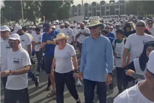  ?? Supplied photo ?? Media profession­als take part in the ‘Walk to Give’ initiative organised by the National Media Council in Abu Dhabi on Friday to show solidarity with the UAE’s Year of Giving. —