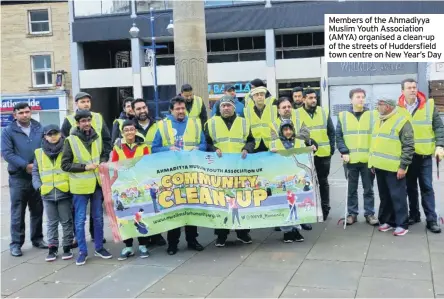  ??  ?? Members of the Ahmadiyya Muslim Youth Associatio­n (AMYA) organised a clean-up of the streets of Huddersfie­ld town centre on New Year’s Day