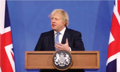  ?? Photograph: Pippa Fowles/No10 Downing Street ?? Boris Johnson promises ‘some semblance of normality’ at the Downing Street press conference on 5 April.