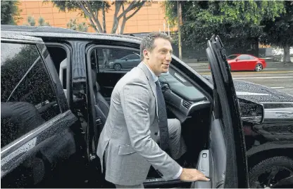  ?? /Bloomberg ?? Moving on: Alex Spiro, attorney to Elon Musk, leaves the federal court in Los Angeles, California last Friday after Musk defended a defamation claim. Spiro is a former prosecutor based in New York who lists rapper Jay-Z among his former clients.