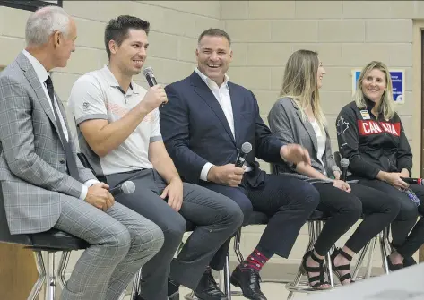  ?? PHOTOS: DEREK RUTTAN ?? San Jose Sharks forward Logan Couture, second from left, speaks during a panel on concussion­s on Wednesday as part of a conference at Western University in London, Ont. Also on the panel are hockey broadcaste­r Ron MacLean, former NHL player Eric...