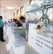  ?? REUTERS FILE ?? Sealed ballot boxes inside a polling centre in Gujarat.