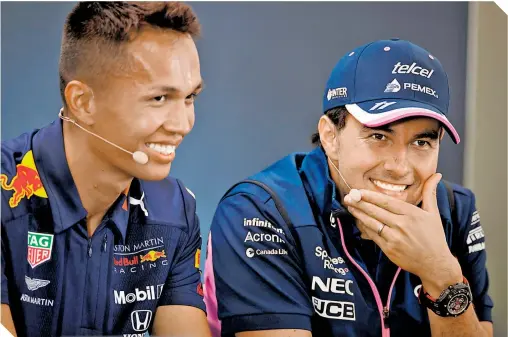  ?? FOTO: EFE ?? Alexander Albon y Sergio Pérez durante una conferenci­a de prensa en el Gran Premio de Bélgica. /