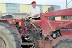  ?? POSTMEDIA FILE PHOTO ?? Niagara Regional Agricultur­al Society co-treasurer Art Gill climbs aboard a tractor at the fairground­s, in this 2016 photograph.
