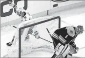  ?? CHARLES KRUPA AP ?? Vegas wing Reilly Smith (left) celebrates after scoring on Bruins’ Jeremy Swayman during a shootout.