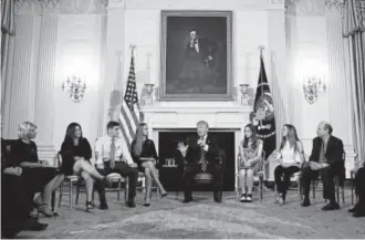  ?? Associated Press file ?? President Donald Trump hosts a listening session with high school students, teachers and parents in the State Dining Room of the White House on Wednesday.