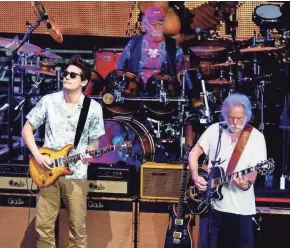  ?? MILWAUKEE JOURNAL SENTINEL CALVIN MATTHEIS / ?? Dead &amp; Company, pictured performing at Alpine Valley Music Theatre in 2016, returns to the East Troy amphitheat­er on June 22 and 23.