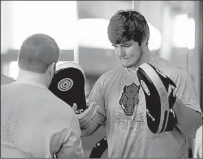  ?? NWA Democrat-Gazette file photo ?? Kirby Adcock, 6-5, 290 pounds, has been working with Arkansas strength and conditioni­ng coach Ben Herbert to try and get his weight back to 300 pounds by the start of fall camp.