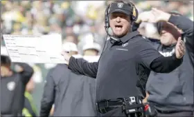  ?? AP PHOTO/JEFFREY PHELPS ?? Oakland Raiders head coach Jon Gruden reacts during the second half of an NFL football game against the Green Bay Packers on Sunday, in Green Bay, Wis.