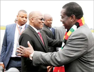  ??  ?? President Mnangagwa is welcomed by his Tanzanian counterpar­t President John Magufuli on arrival for a two-day State visit to the East African country. — (Picture by Presidenti­al photograph­er Joseph Nyadzayo)