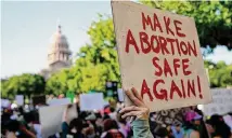  ?? Eric Gay/Associated Press ?? People march in support of abortion rights in Austin in 2022. The Kate Cox case shows the folly of Texas' abortion ban.