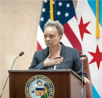  ?? ASHLEE REZIN GARCIA/SUN-TIMES FILES ?? Mayor Lori Lightfoot delivering her 2021 budget address last month at City Hall.