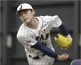  ?? KYODO NEWS VIA AP ?? Japanese pitcher Roki Sasaki works out at a team camp of the World Baseball Classic, in Miyazaki, southern Japan, on Feb. 19. All eyes will be on Japanese baseball pitcher Sasaki at the World Baseball Classic. He is regarded as the next big thing in baseball out of Japan.