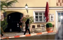  ?? PHOTO: REUTERS ?? Police secure the area after an explosion in Ansbach, near Nuremberg.