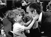  ?? FOCUS FEATURES ?? “Mister Rogers’ Neighborho­od” host Fred Rogers meets a fan in the documentar­y “Won’t You Be My Neighbor?”