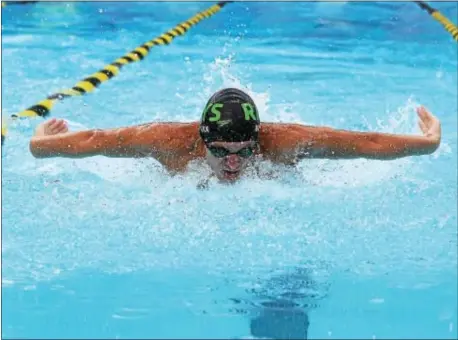  ?? PETE BANNAN — DIGITAL FIRST MEDIA ?? Alex Boeckx of Ridley Township, pictured here competing at the Delco Swim League Meet of Champions last summer, broke a pair of Aldan pool records in the 18-and-under individual medley and breaststro­ke Saturday. Boeckz finished with three wins on the...