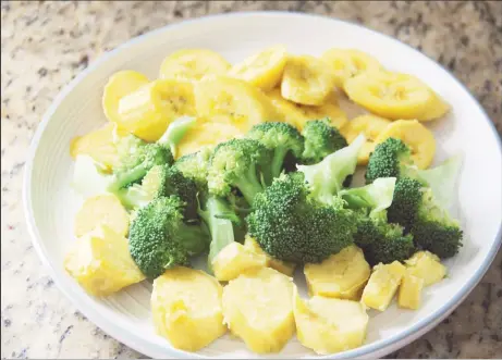  ?? ?? Steamed ripe plantain, broccoli and yellow-flesh sweet potato (Photo by Cynthia Nelson)