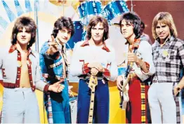  ??  ?? The Bay City Rollers in their heyday: Alan Longmuir (centre) with Eric Faulkner, Les Mckeown, Stuart ‘Woody’ Wood and Derek Longmuir