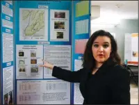  ?? The Sentinel-Record/Grace Brown ?? RESULTS ARE IN: Halo Skinner, of Sherwood, presents her research on water quality in Bull Bayou during the 2018 West Central Regional Science Fair Thursday at the Arkansas School for Mathematic­s, Sciences, and the Arts.
