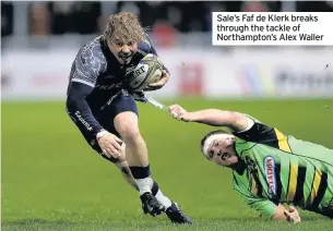  ??  ?? Sale’s Faf de Klerk breaks through the tackle of Northampto­n’s Alex Waller