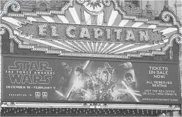  ??  ?? The marquee of the El Capitain theatre as it promotes the soon-to-be-released ‘Star Wars: The Force Awakens’ in Hollywood, California, on Thursday. — AFP photo