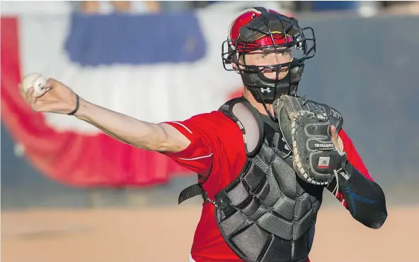 ?? — GERRY KAHRMANN/PNG FILES ?? ‘I’m working on understand­ing my pitchers,’ says Vancouver Canadians catcher Riley Adams.