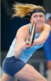  ?? AFP ?? Elina Svitolina hits a return against Carla Suarez Navarro during their first round match at the Brisbane Internatio­nal tennis tournament in Brisbane. —