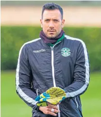  ??  ?? OUT TO MAKE HIS MARK: Guy Melamed at the centre of things after joining his new team-mates at training at McDiarmid Park yesterday, left, and two countrymen the Israeli striker sounded out before making the decision to come to Scotland, Nir Bitton of Celtic and Hibs keeper Ofir Marciano.