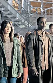  ??  ?? Rise of the robots: Gemma Chan and Ivanno Jeremiah