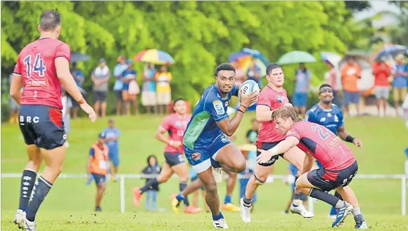  ?? Picture: REINAL CHAND ?? Fijian Drua’s Iosefo Masi goes on attack against Melbourne Rebels during the trial match at Prince Charles Park in Nadi.