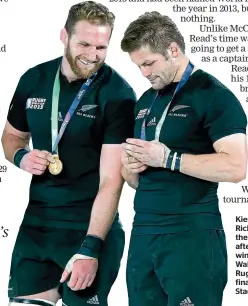  ?? GETTY IMAGES ?? Kieran Read and Richie McCaw enjoy their winners’ medals after the All Blacks win over the Wallabies at the 2015 Rugby World Cup final at Twickenham Stadium.