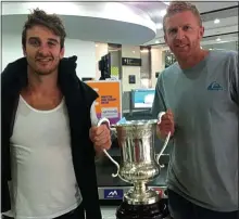  ??  ?? ON A HIGH: Australia’s Jobe Watson and Dustin Ftetcher with the Cormac McAnallen Cup (main) and Pearce Hanley (below)