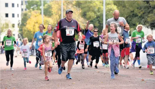  ?? PETER BOLTER ?? A Family Fun Run took place yesterday afternoon around Cardiff’s Civic Centre, ahead of today’s Half Marathon