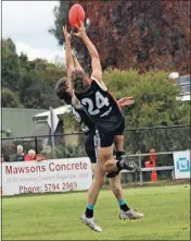  ?? ?? Air-time: Nagambie’s Tom Madden plucks one out of the air.