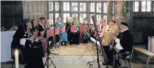  ??  ?? Macclesfie­ld Branch of the Society of Recorder Players performing at Little Moreton Hall’s Tudor Christmas