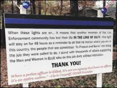  ?? TYLER ESTEP / TYLER.ESTEP@AJC.COM ?? Snellville City Councilman Bobby Howard put a 4-by8-foot sign in his yard following the death of five police officers in Dallas, Texas.