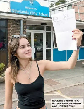  ?? ?? Newlands student Inika Nicholls holds her results aloft. Ref:134785-3