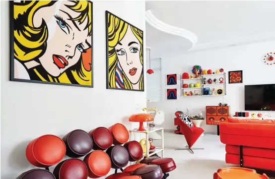  ??  ?? ABOVE A Nelson Marshmallo­w sofa from Herman Miller in orange and red tones is a cheerful addition to the lounge area. Retropop art prints from Carousell complement the living room’s palette. RIGHT Alvin, who adores the 1970s and Space Age style, says...